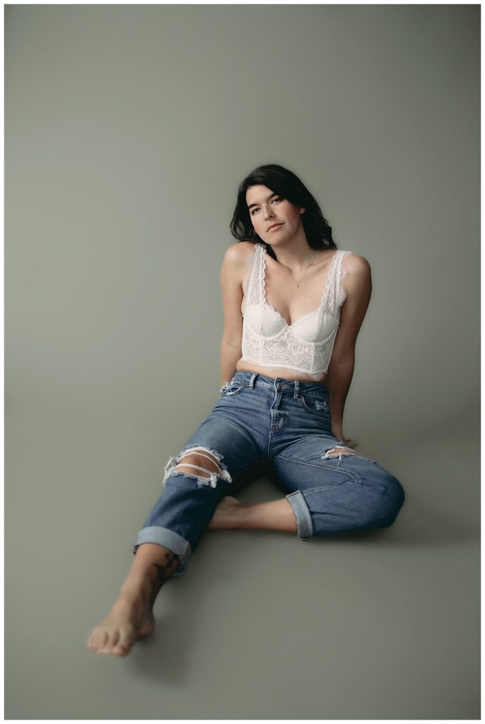 Make Your Session Yours by doing what makes you most confident like this woman in jeans and bralette